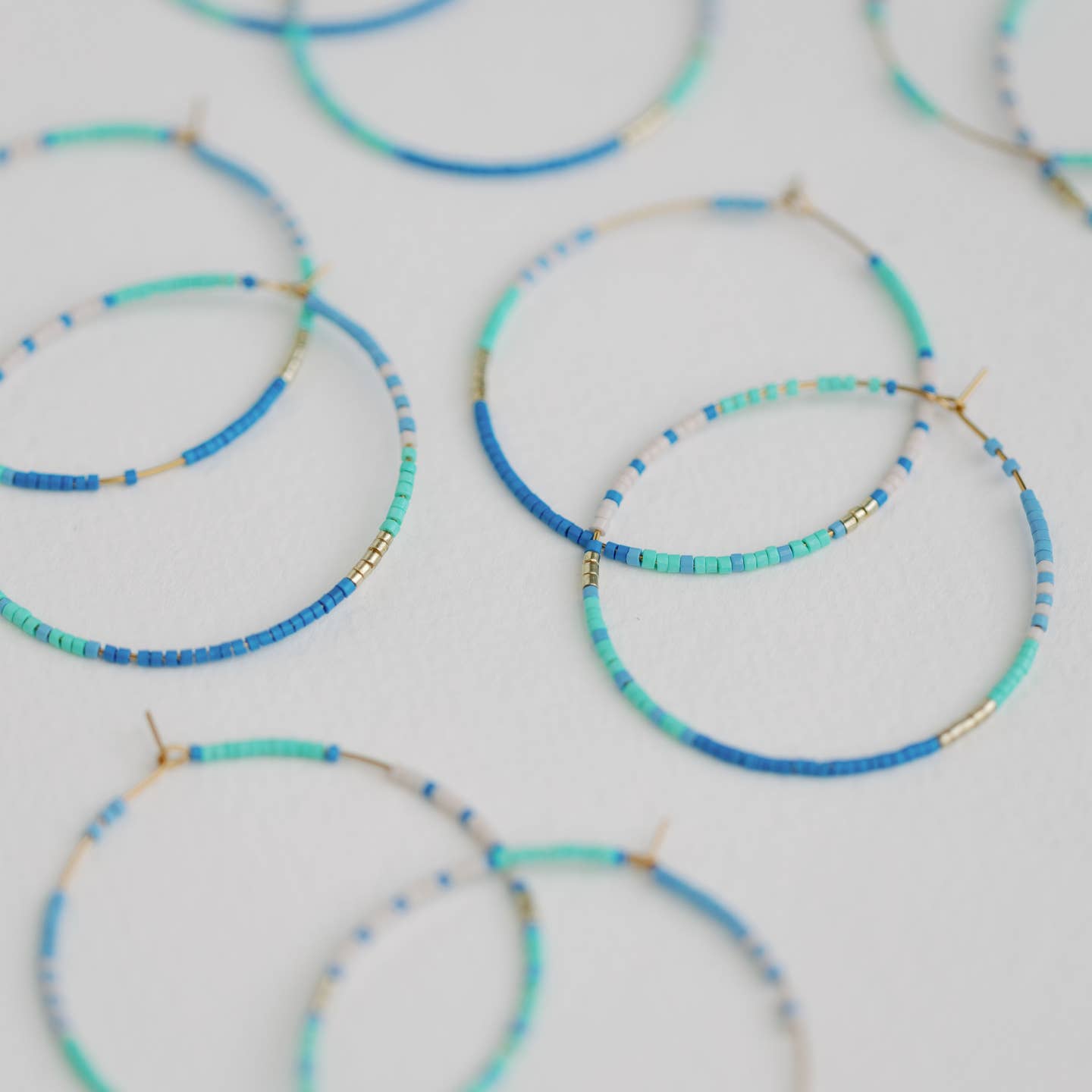 Skinny Blue Beaded Statement Hoop Earrings